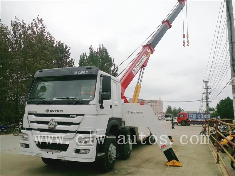 Sinotruk HOWO 8X4 371HP 360 Degree Rotation Lifting Boom 40tons Wrecker Towing Truck for Road Recovery Rescue