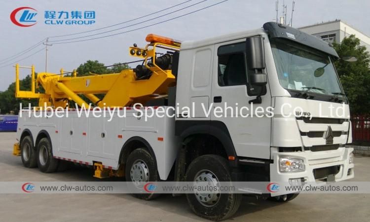 Sinotruk HOWO 8X4 371HP 360 Degree Rotation Lifting Boom 40tons Wrecker Towing Truck for Road Recovery Rescue