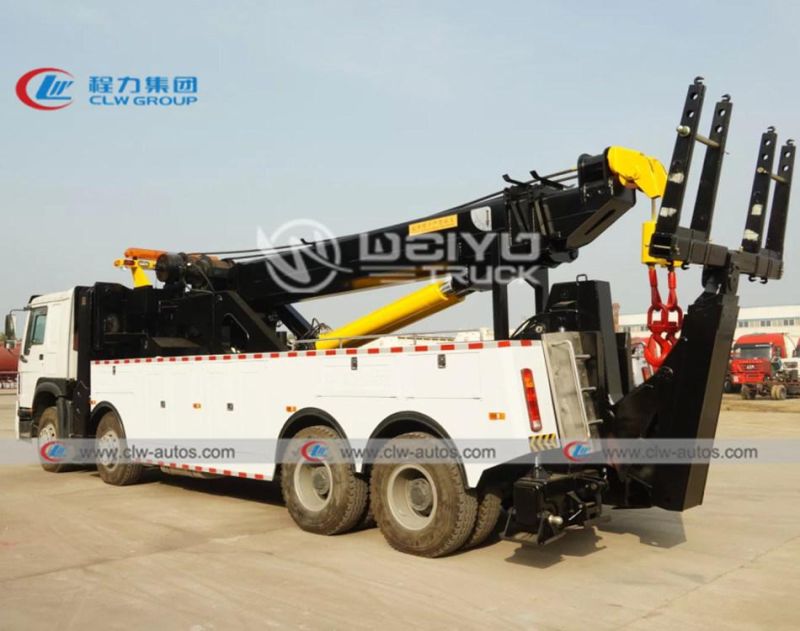 Sinotruk HOWO 8X4 420HP Right Hand Drive Rhd Rotation 50tons Road Recovery Wrecker Tow Truck with Two 25tons Winches