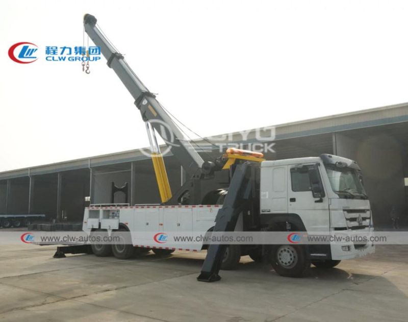 Sinotruk HOWO 8X4 420HP Right Hand Drive Rhd Rotation 50tons Road Recovery Wrecker Tow Truck with Two 25tons Winches