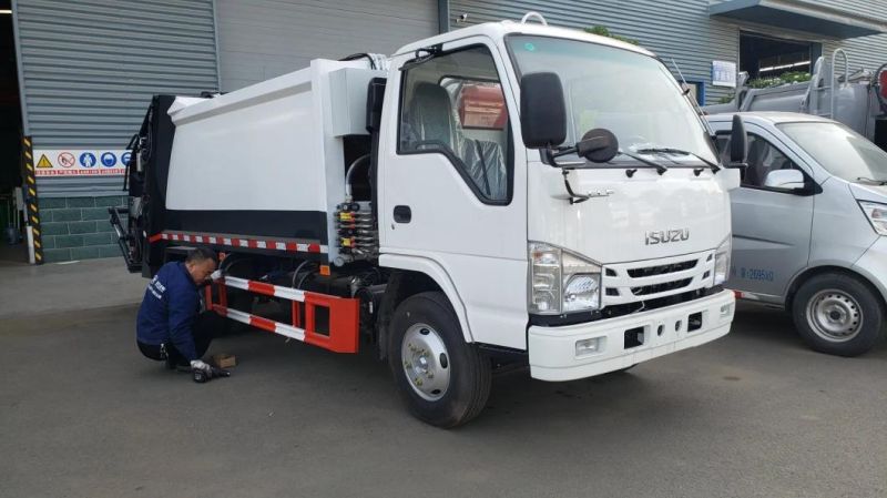 Isuzu 6cbm 7cbm 8cbm Compactor Garbage Truck 4X2 Drive Garbage Truck HOWO Can Choose