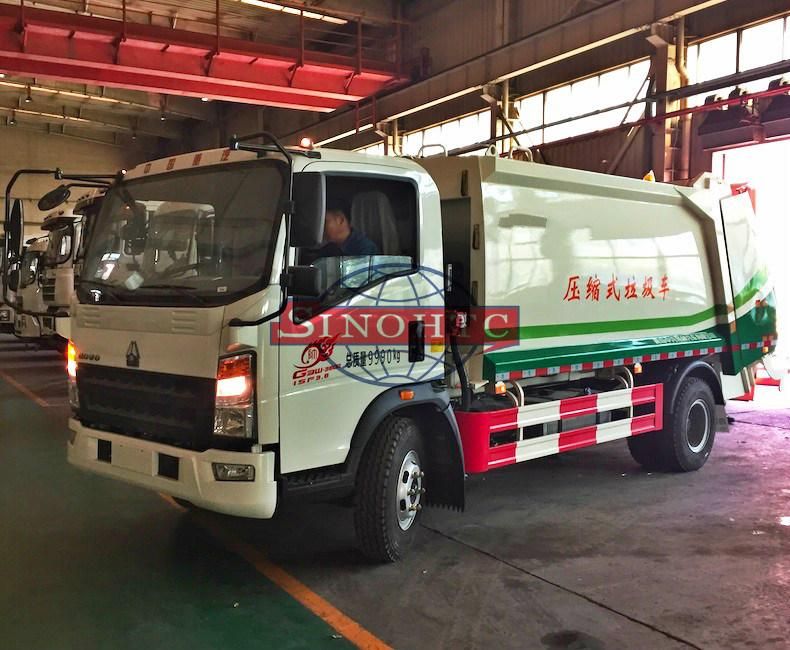 HOWO compactor garbage truck/ 4m3 refuse compactor garbage truck