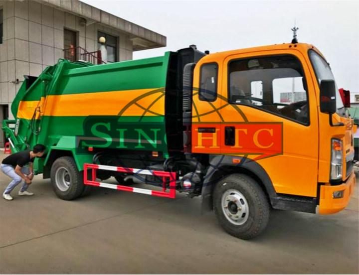 HOWO compactor garbage truck/ 4m3 refuse compactor garbage truck