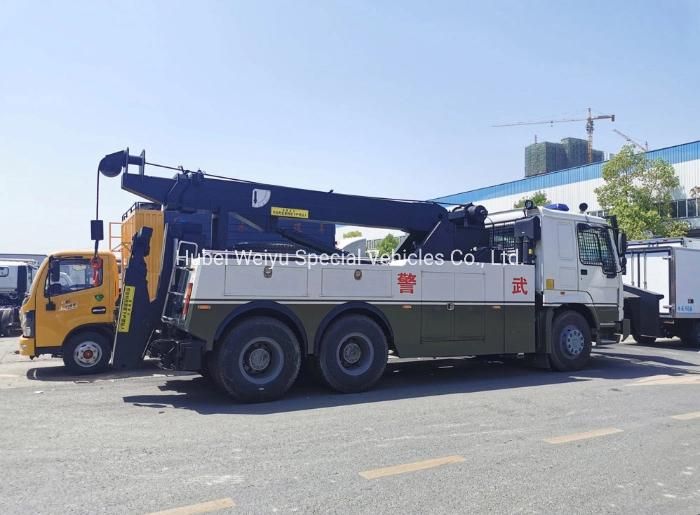 Full Wheel Driving 6X6 Anti Riot Barrier Break Through Sinotruk HOWO 16ton Heavy Duty Road Recovery Wrecker Tow Truck with Front Shovel