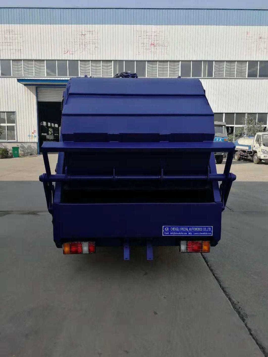 I Suzu 4X2 LHD 5cbm Garbage Compactor Truck