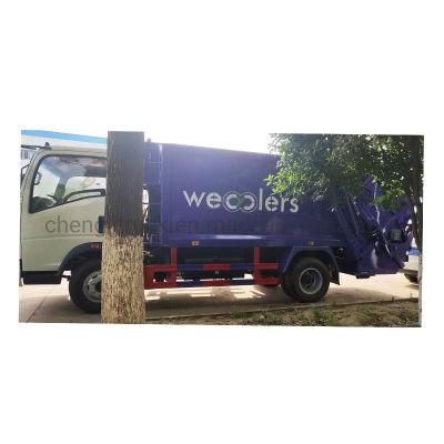 HOWO 6cbm 4*2 Compressed Sanitation Rubbish Collector Dust Cart Garbage Collection Hook Lift Roll off Waste Compactor Garbage Truck