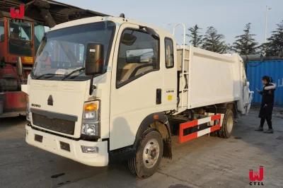 8~12m3 Capacity 4X2 Sinotruk Cnhtc HOWO Compressed Garbage Truck with