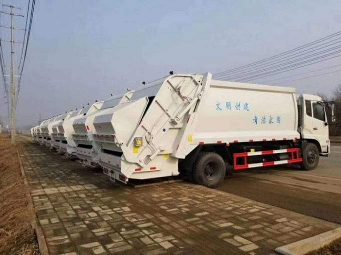 Isuzu 6-7 Tons Self Compressing Garbage Compactor Truck 6cbm 7cbm 4*2 Waste Removal Truck
