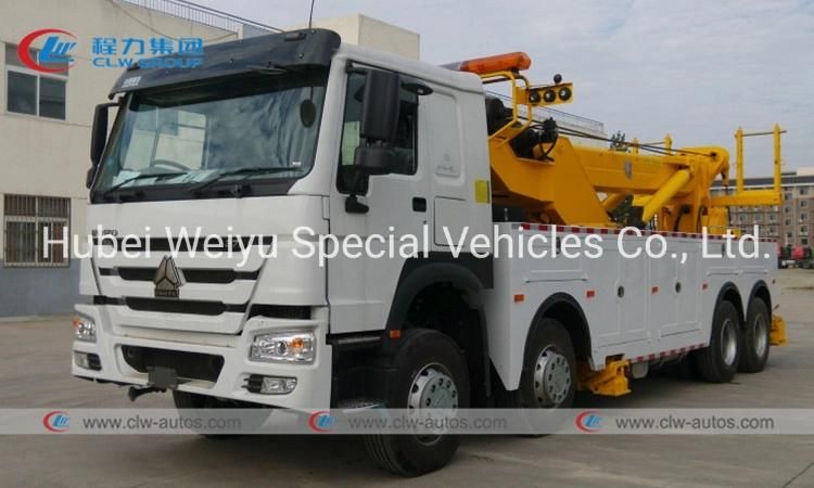 Sinotruk HOWO 8X4 371HP 360 Degree Rotation Lifting Boom 40tons Wrecker Towing Truck for Road Recovery Rescue