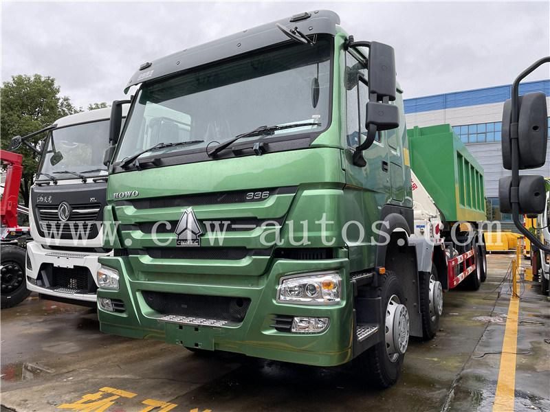 Sinotruk HOWO 8X4 LHD Hydraulic Hooklift Garbage Truck with 18-20cbm Garbage Container with 5 Tons Folded Arm Crane