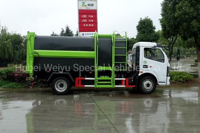 China Dongfeng 7cbm/7000liters Side Loading Hang Barrel Type Compressing Compactor Garbage Truck