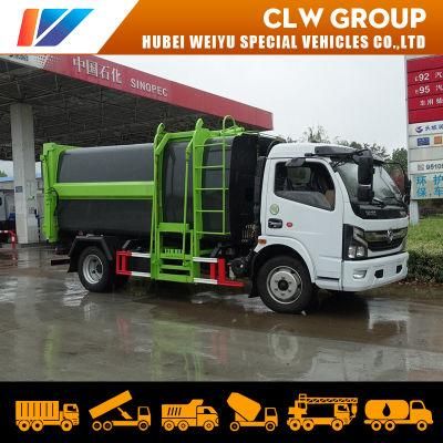 China Dongfeng 7cbm/7000liters Side Loading Hang Barrel Type Compressing Compactor Garbage Truck