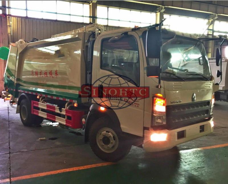 HOWO compactor garbage truck/ 4m3 refuse compactor garbage truck