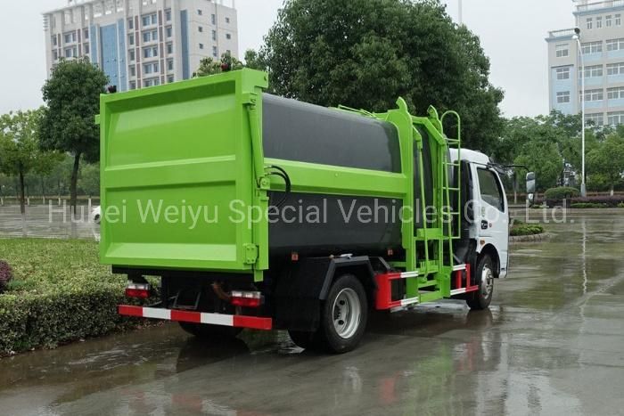 China Dongfeng 7cbm/7000liters Side Loading Hang Barrel Type Compressing Compactor Garbage Truck